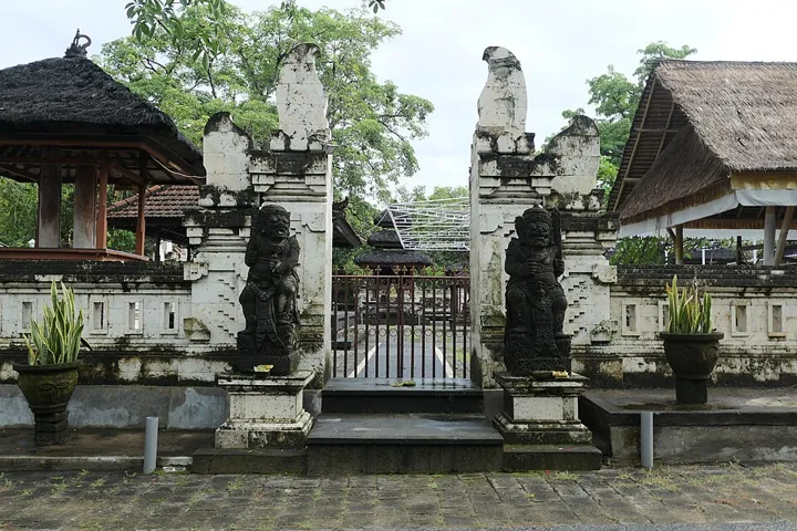 Carved entrance gateway at Pura Sakenan temple, Serangan, Bali